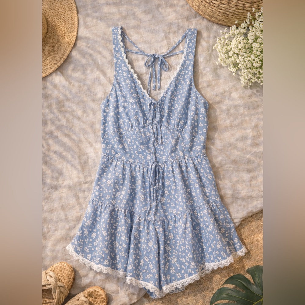 Francesca’s Blue Ditsy Floral Romper